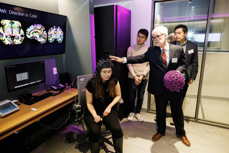 Gregory McCarthy, Henry Ford II Professor of Psychology, whose research focuses on the functional organization of the human brain, led an interactive demonstration of scalp EEG recordings. 
