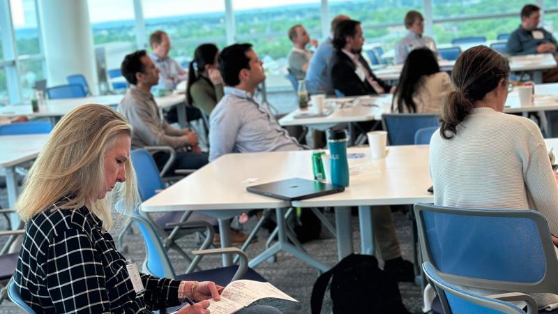 Wu Tsai Faculty Members brainstorming research topics during the conference.