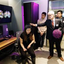 Gregory McCarthy, Henry Ford II Professor of Psychology, whose research focuses on the functional organization of the human brain, led an interactive demonstration of scalp EEG recordings. 