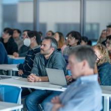 Attendees listening to a presentation during the WTI Symposium: Building Blocks of Behavior.