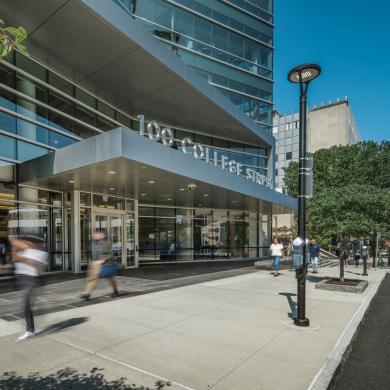 Front entrance to 100 College Street building, view from the sidewalk