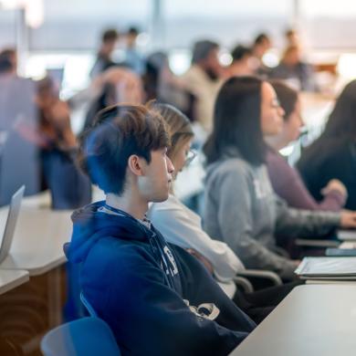 Attendees listening to a presentation during WTI's symposium, Building Blocks of Behavior.